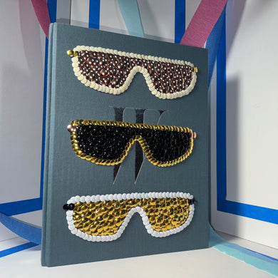 W : Stories / Magazine Sunglasses (Oliver Peoples) bms gilded book.