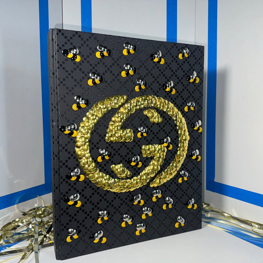 BEE Gucci man- gold gilded coffee table book by the bms.